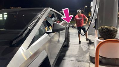 tesla cybertruck at a gas station 1