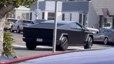 black wrapped cybertruck looks like batmobile