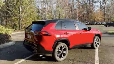 202320toyota20rav420prime20xse20supersonic20red20back20end 0