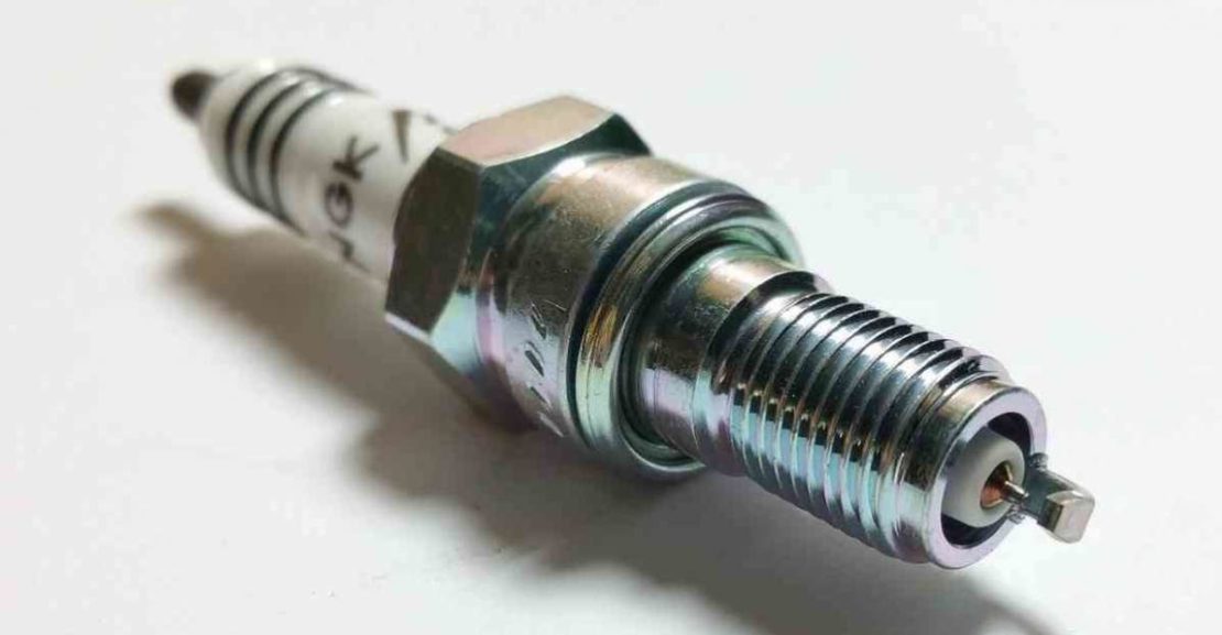 spark plug maintenance warning